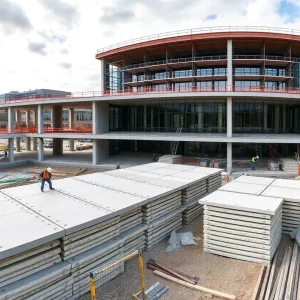 Construction workers assembling precast concrete panels for Raleigh's new City Hall.